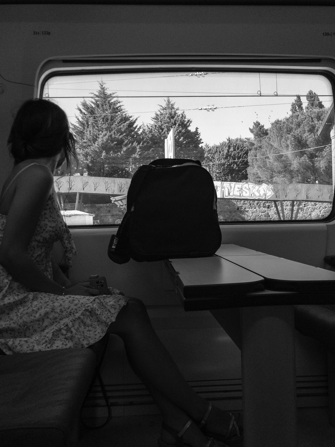 Young lady, looking through the window (no face) (c) pmartinasi 