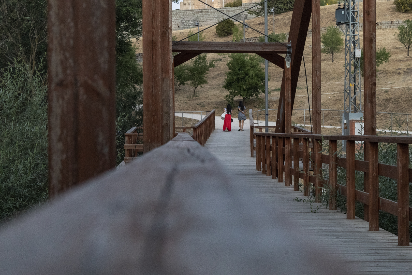 Wooden Bridge in Park Setting Leading to Hillside Path in Ávila, Spain. (c) pmartinasi