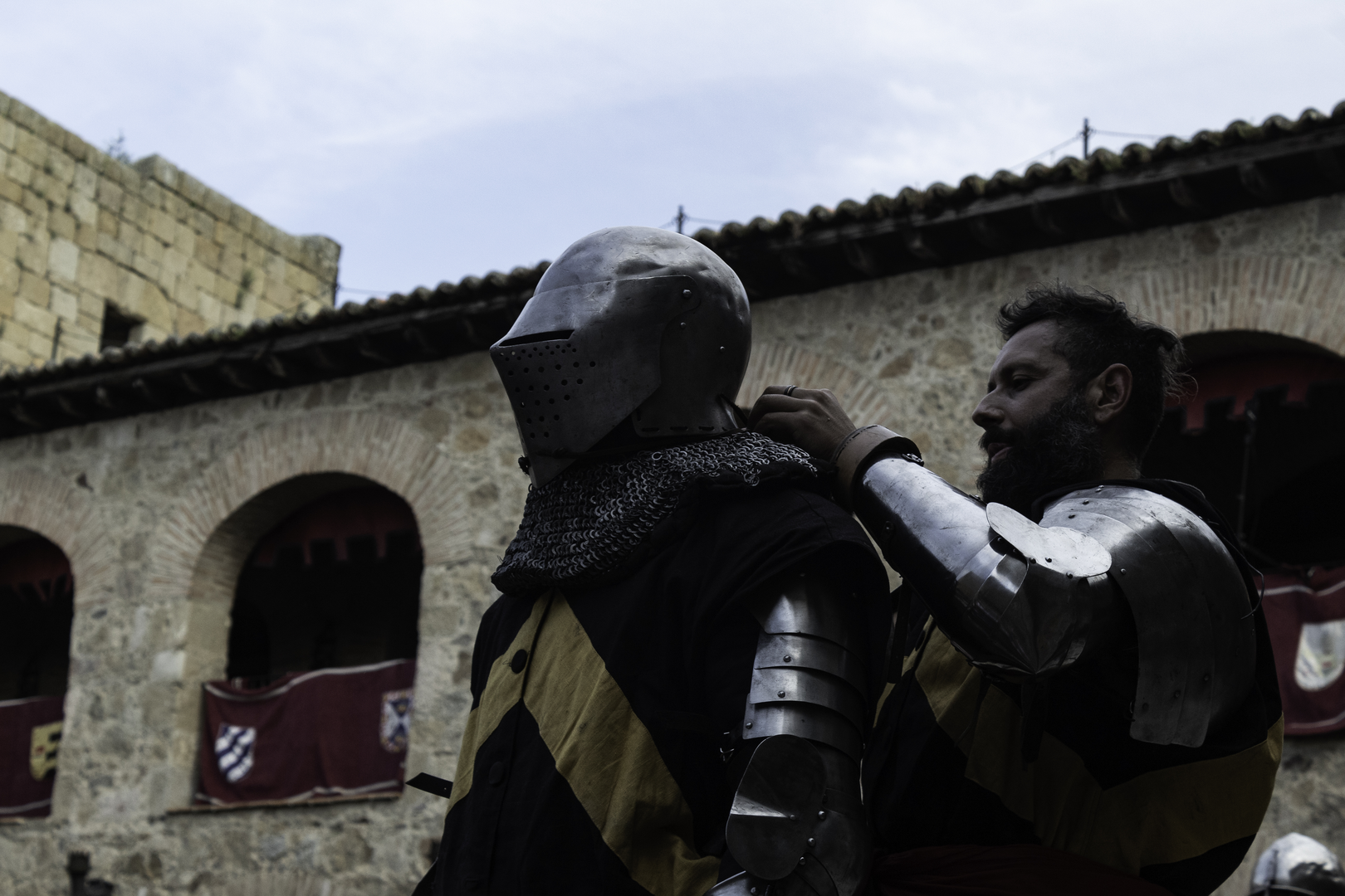 Warrior getting ready fo a sword and shield duel tournament at Medieval Fair, Oropesa, Toledo, Spain ( IG/@indomitus.medievalcombatclub) (c) pmartinasi