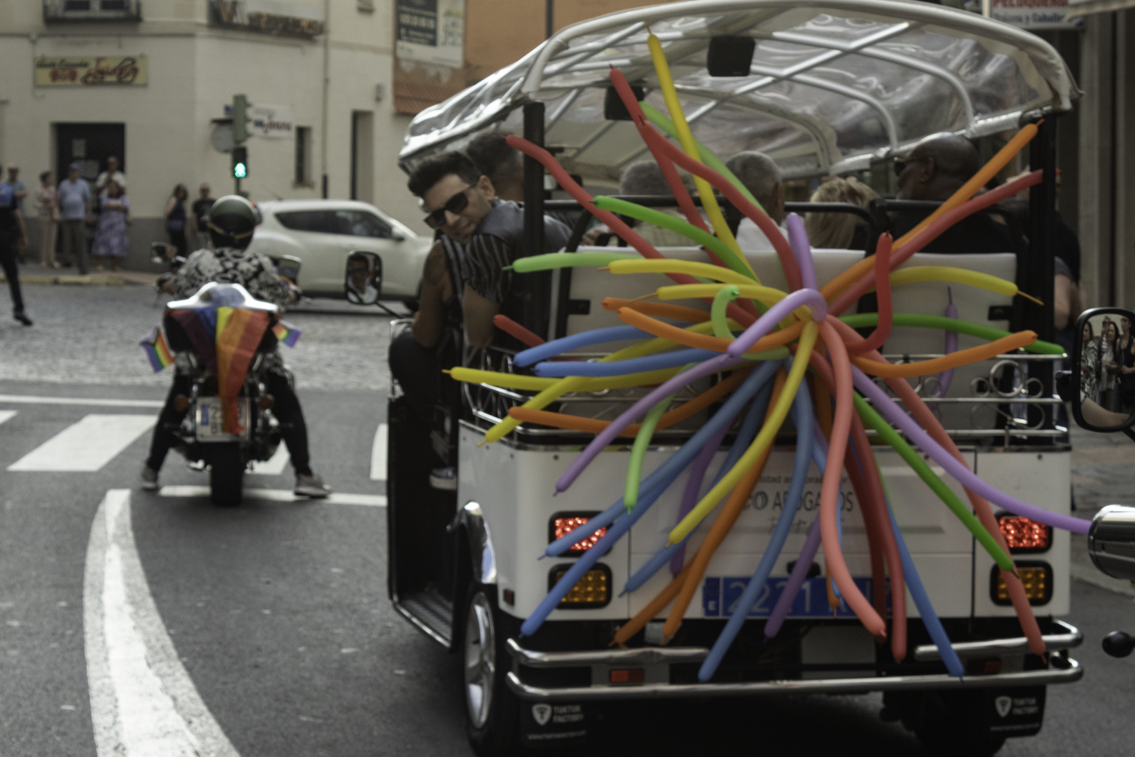  Colourful parade float with people celebrating Pride Day in Ávila, Spain, during the annual LGBTQ+ festival (2025) (c) pmartinasi