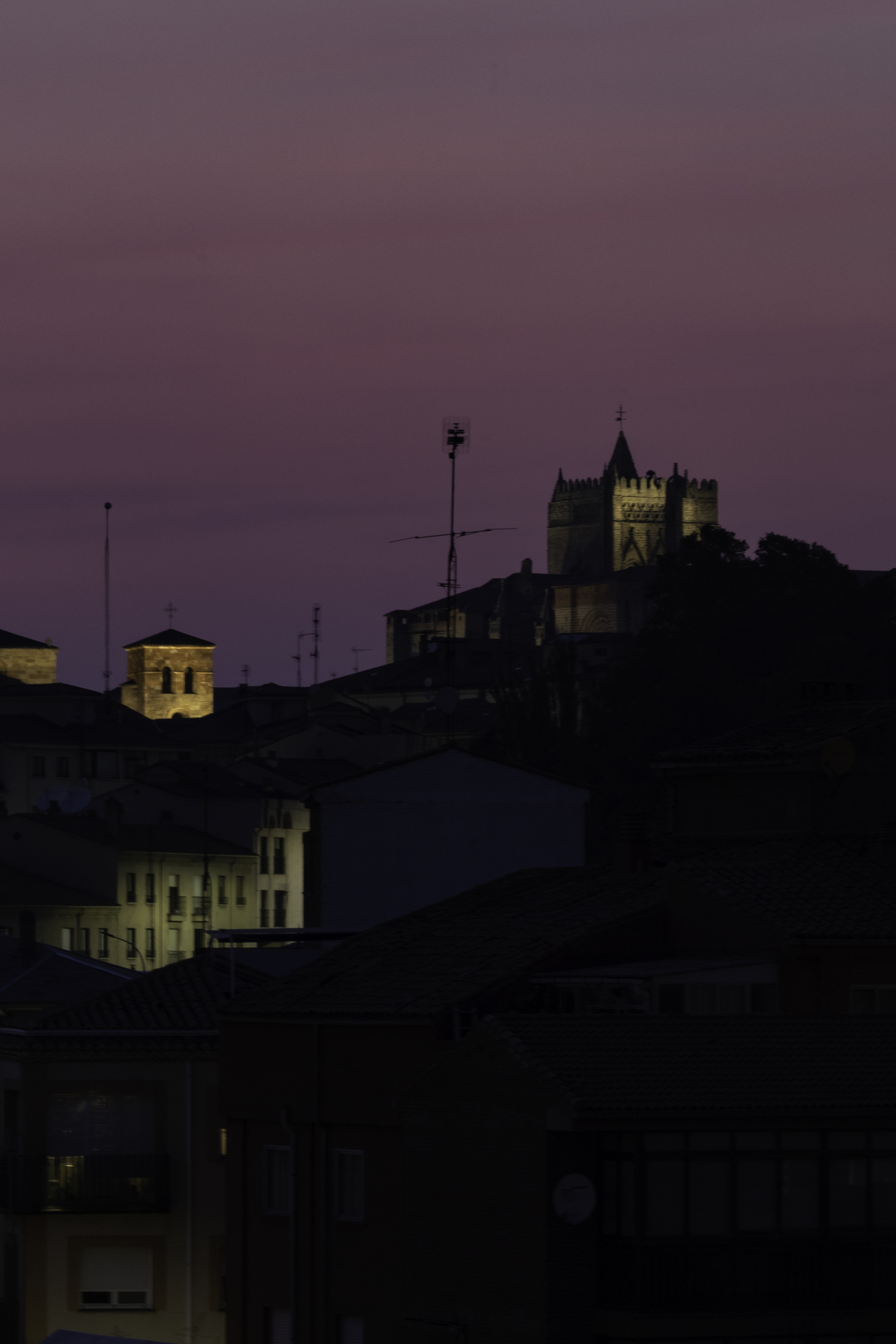  Nightfall with dust and ash, over the Avila's city center after several fires in the central plateau, Castile, Spain. . (c) pmartinasi
