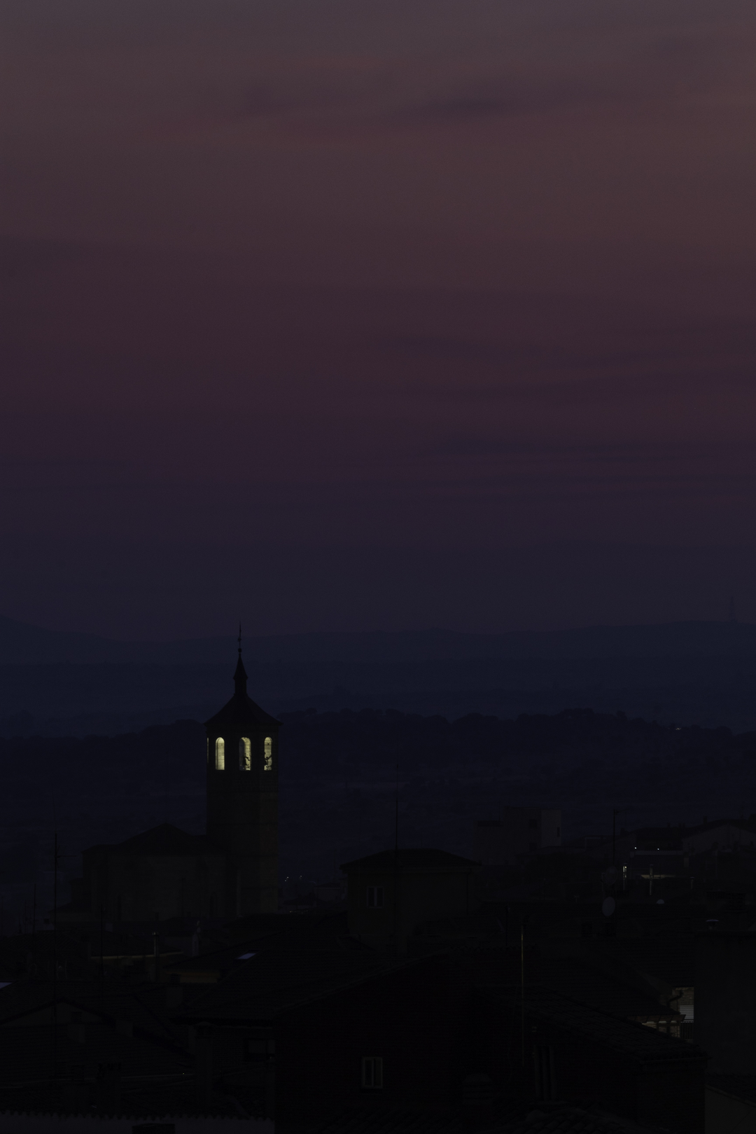  Nightfall with dust and ash, over the Avila's city center after several fires in the central plateau, Castile, Spain. . (c) pmartinasi