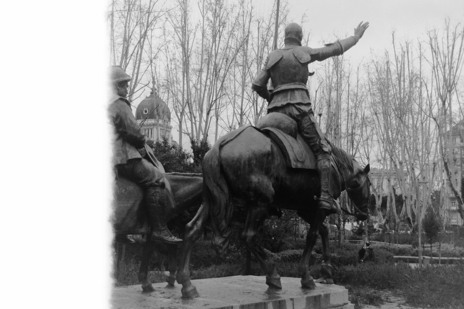 Monumental Don Quixote and Sancho Panza Statue at Plaza de España in Madrid Captured in Black and White (c) pmartinasi