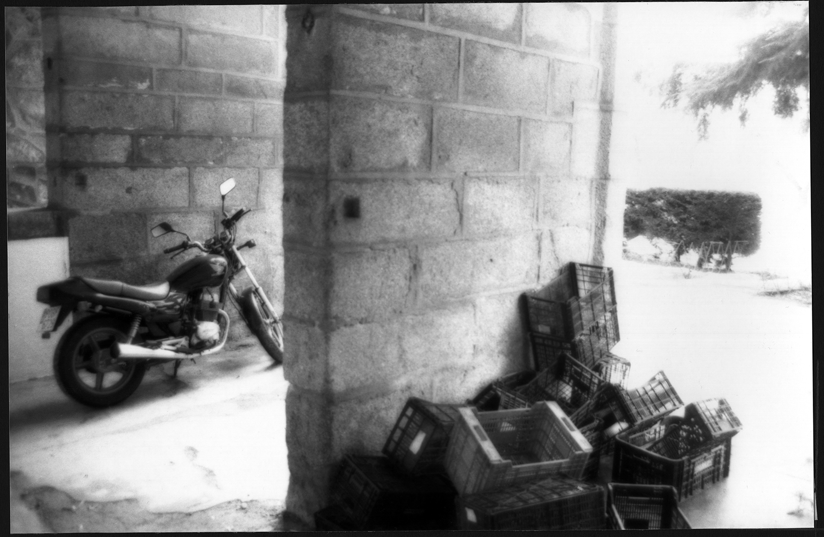Motorbike parked near the column (c) pmartinasi