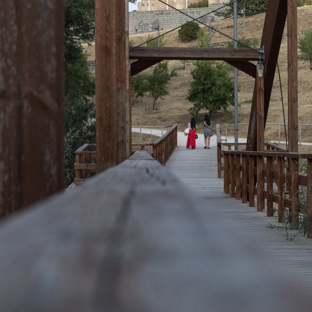  Wooden Bridge in Park Setting Leading to Hillside Path in Ávila, Spain. (c) pmartinasi