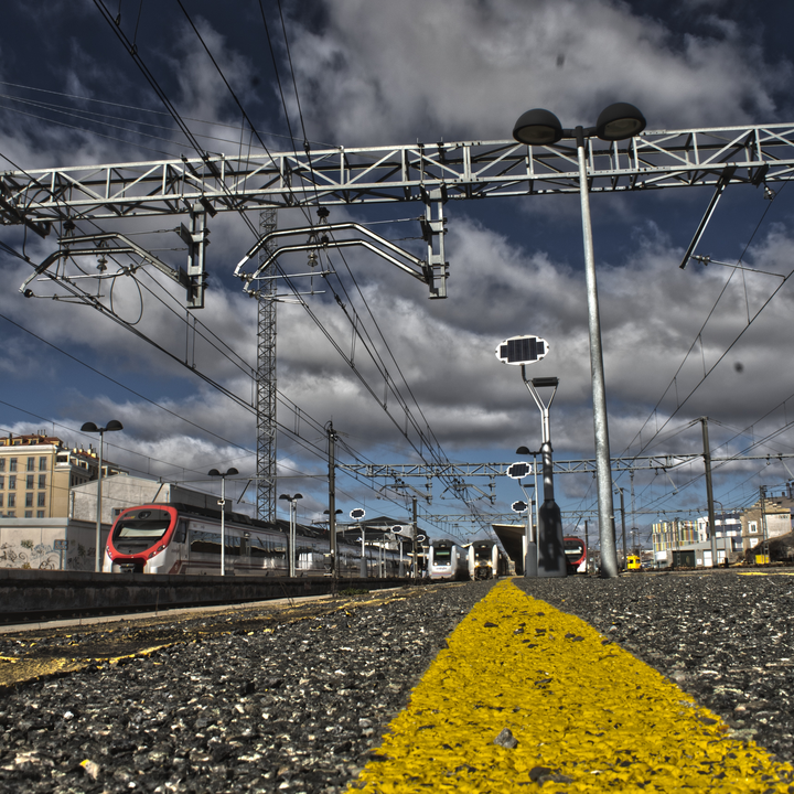 Passenger Trains Waiting at Ávila Station Bound for Madrid Príncipe Pío During Wind Disruption.