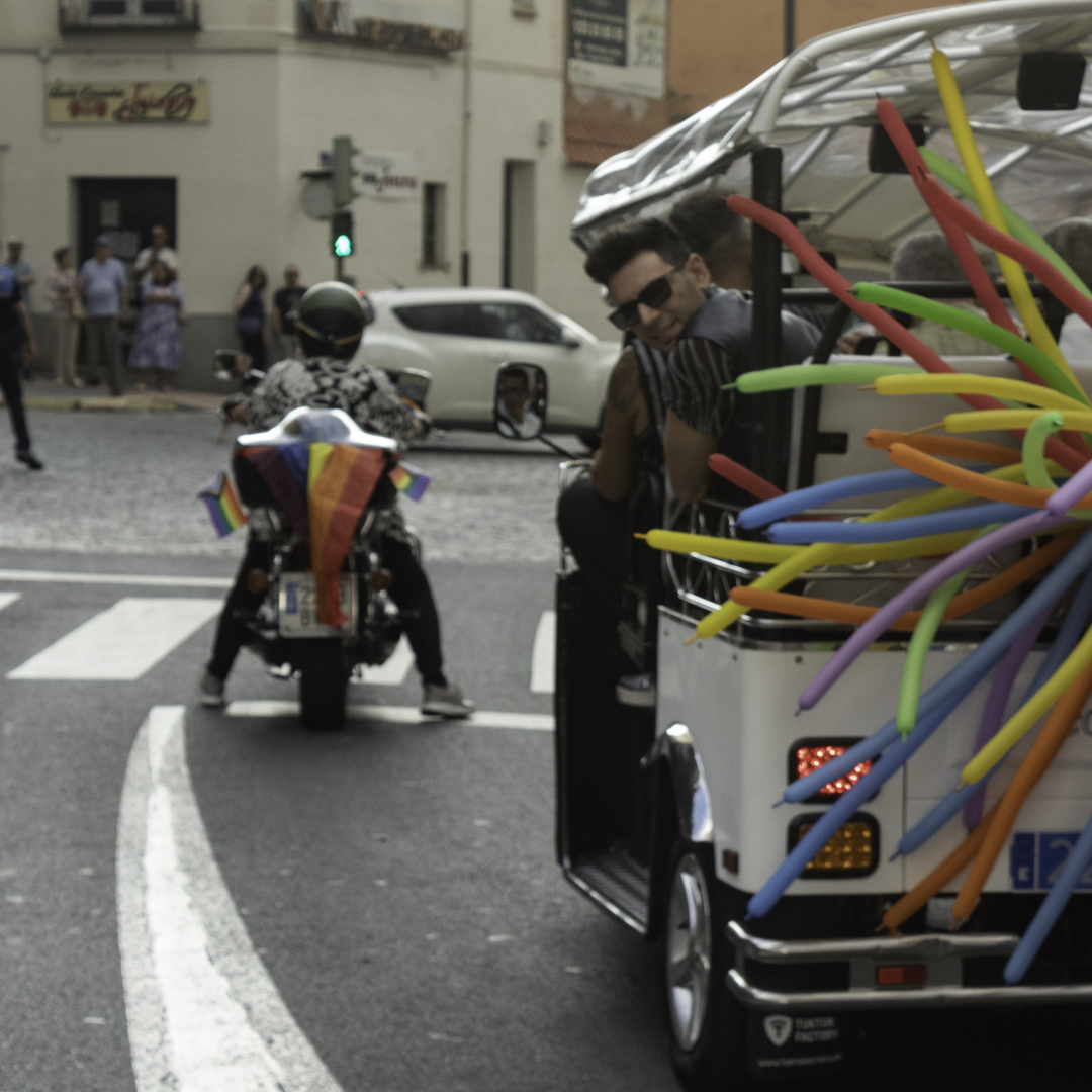  Colourful parade float with people celebrating Pride Day in Ávila, Spain, during the annual LGBTQ+ festival (2025) (c) pmartinasi