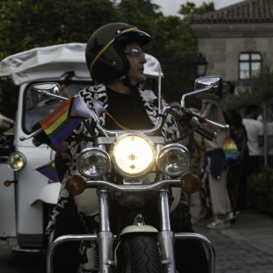  Colourful parade float with people celebrating Pride Day in Ávila, Spain, during the annual LGBTQ+ festival (2025) (c) pmartinasi