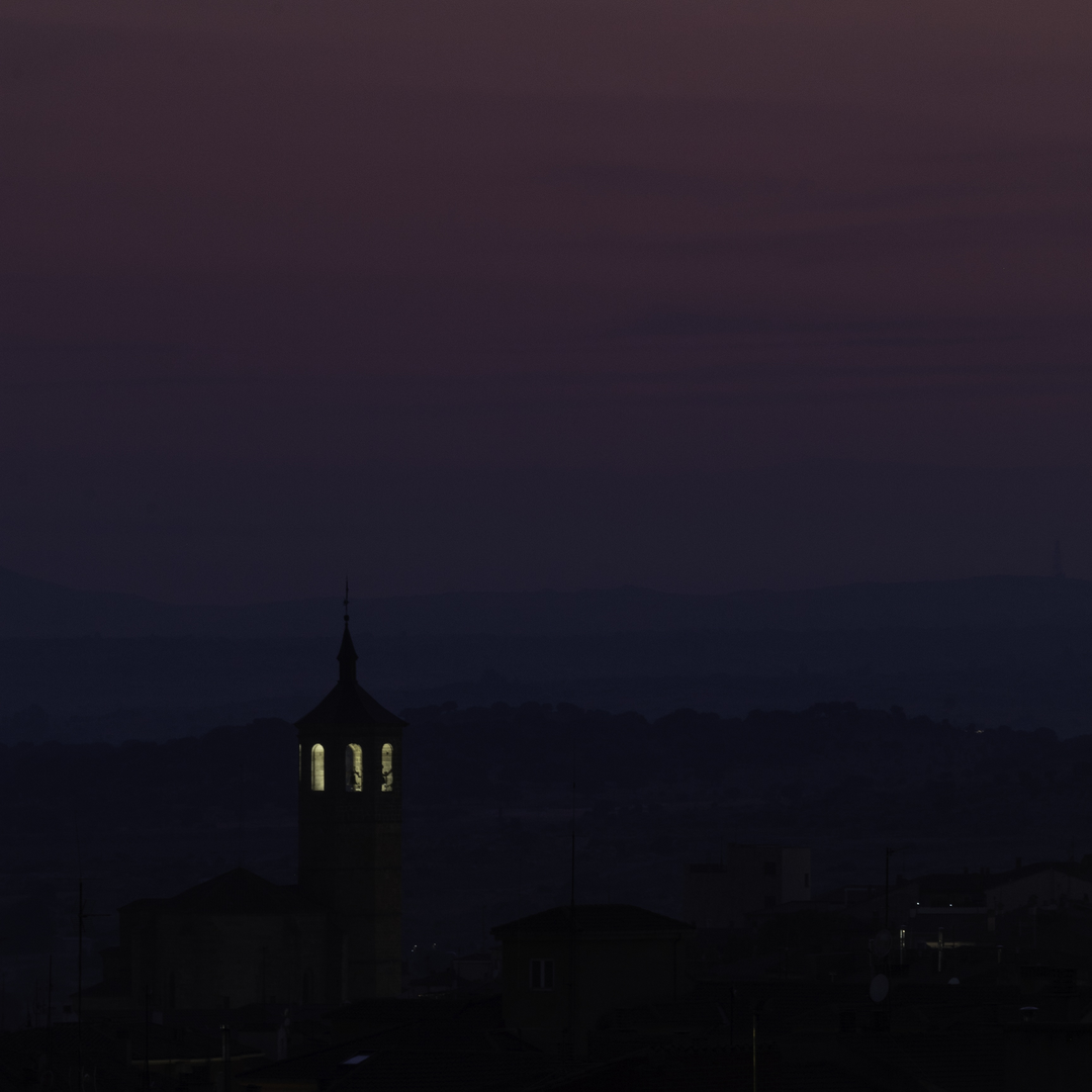  Nightfall with dust and ash, over the Avila's city center after several fires in the central plateau, Castile, Spain. . (c) pmartinasi