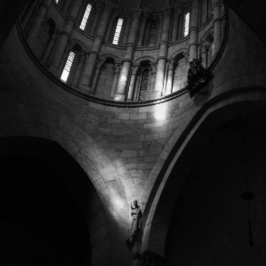  Awe-inspiring view of the interior of the Old Cathedral of Salamanca, Spain, bathed in warm sunset light. (c) pmartinasi