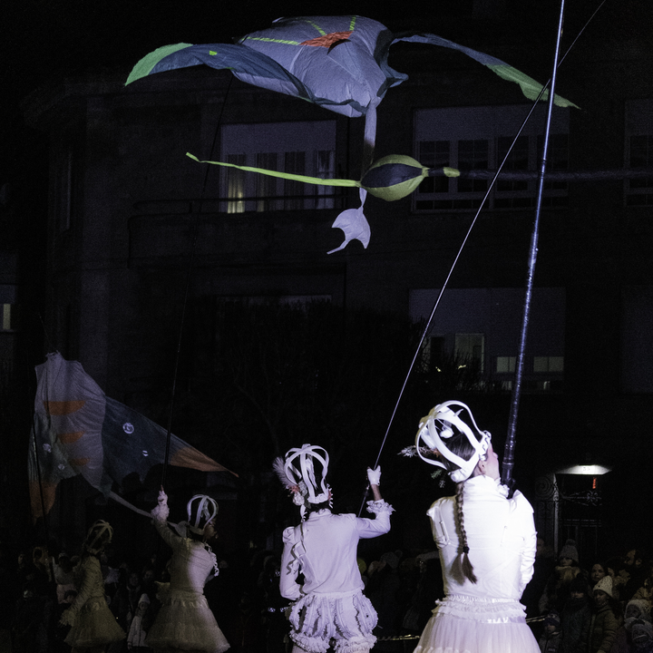  Night scene of performers dressed in white costumes during the Three Wise Men Parade 2026 in Ávila, Spain, as they move through the streets before a gathered crowd, highlighting the festive, artistic and cultural spirit of Epiphany. January 2026. (c) pmartinasi